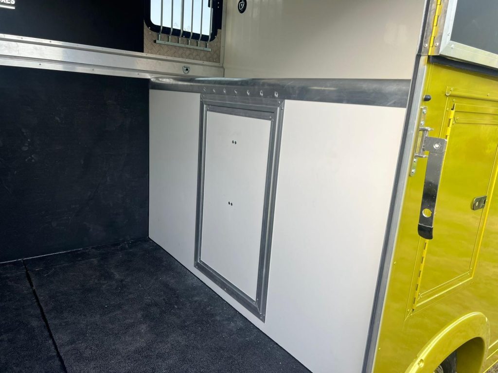 Inside yellow horsebox